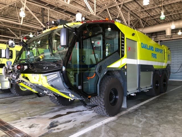 Oakland Airport Fire ARFF apparatus inside the apparatus bay.