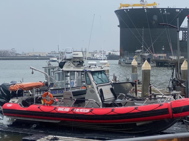 Oakland Fire Rescue rigid inflatable boat docked at the marina.